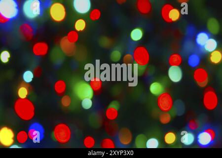 Holiday background from color unfocused lights Stock Photo