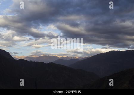 Panoramic view of a sunrise in the Colca Canyon in Peru Stock Photo