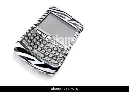 BlackBerry 8310 Curve Smartphone in a fancy stripy zebra cover Isolated on white background Stock Photo