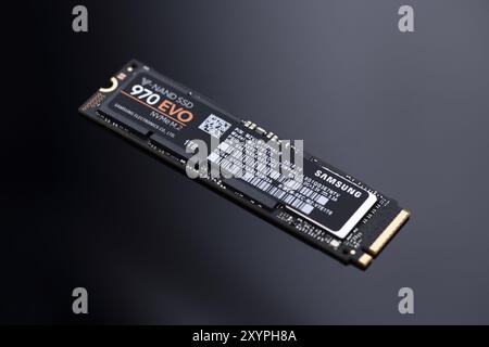 Closeup of V-NAND M.2 SSD drive Samsung 970 EVO isolated on black Stock Photo