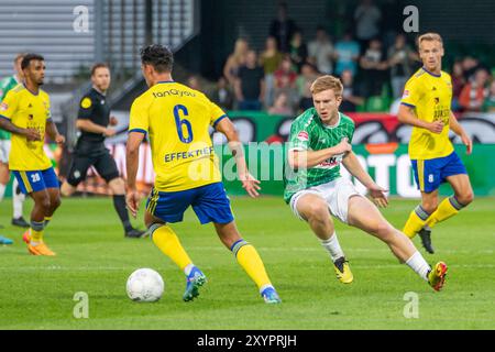 Rotterdam - Jeremy van Mullem of SC Cambuur, Devin Haen of FC Dordrecht during the fourth competition round of the Keuken Kampioen Divisie season 2024/2025. The match is set between FC Dordrecht and SC Cambuur at M-Scores Stadion on 30 August 2024 in Rotterdam, The Netherlands. (VK Sportphoto/Nick Koole) Stock Photo