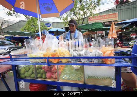 Bangkok, Thailand, September 04, 2016: Fruit seller on Street food in thailand, Asia Stock Photo