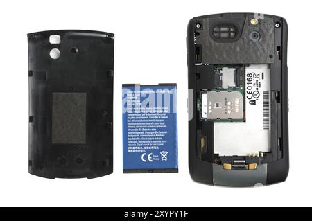 BlackBerry 8310 Curve Smartphone with removed cover and a battery Isolated on white background Stock Photo