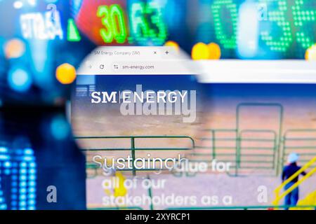 Paraguay. 30th Aug, 2024. In this photo illustration, the SM Energy Company logo seen displayed on a computer screen through a magnifying glass. (Photo by Jaque Silva/SOPA Images/Sipa USA) *** Strictly for editorial news purposes only *** Credit: Sipa USA/Alamy Live News Stock Photo