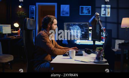 Developer updating artificial intelligence neural networks, typing on computer keyboard in neon lit personal office. Freelancing IT specialist writing AI code, training machine learning, camera B Stock Photo