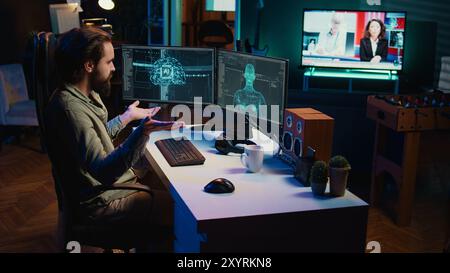 Man unable to believe eyes after seeing AI gaining humanoid form and consciousness, waving hand to salute him. Computer scientist surprised by artificial intelligence greeting him unprompted, camera B Stock Photo