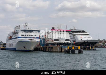 Portsmouth England UK. 18.08.2024. Portsmouth International port with three ships on moorings at this port. Stock Photo