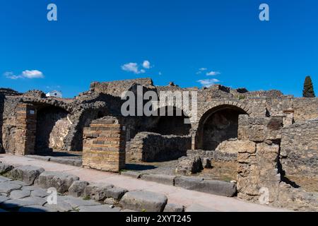 Pompeii, Italy - August 8, 2024: Ruins of a city. Pompeii is an ancient ...