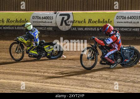 Belle Vue Colts' Freddy Hodder in Red chases Edinburgh Monarchs' Dayle Wood in Yellow during the WSRA National Development League match between Belle Vue Aces and Edinburgh Monarchs at the National Speedway Stadium, Manchester on Friday 30th August 2024. (Photo: Ian Charles | MI News) Credit: MI News & Sport /Alamy Live News Stock Photo