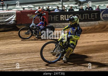 Edinburgh Monarchs' Dayle Wood in Yellow rides inside Belle Vue Colts' Guest Rider Joe Thompson in Red during the WSRA National Development League match between Belle Vue Aces and Edinburgh Monarchs at the National Speedway Stadium, Manchester on Friday 30th August 2024. (Photo: Ian Charles | MI News) Credit: MI News & Sport /Alamy Live News Stock Photo