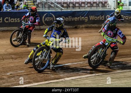 Edinburgh Monarchs' Dayle Wood in White leading Belle Vue Colts' William Cairns in Blue, Belle Vue Colts' Matt Marson in Red and Edinburgh Monarchs' Mark Parker in Yellow during the WSRA National Development League match between Belle Vue Aces and Edinburgh Monarchs at the National Speedway Stadium, Manchester on Friday 30th August 2024. (Photo: Ian Charles | MI News) Credit: MI News & Sport /Alamy Live News Stock Photo