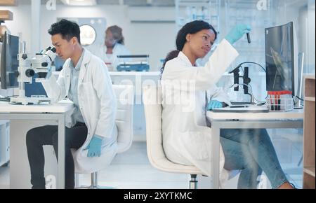 Science, team or tech in lab for experiment, vaccine development or bacteria analysis. Experts, study or test tube for research with blood sample Stock Photo