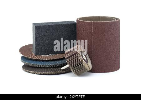 Flap discs for angle grinders, abrasive cloth flap wheels and flap brush wheels for use in drill and sandpaper in close-up view isolated on white back Stock Photo