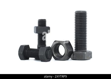 Orderly arrangement of dark-colored metal of hex bolts and nuts include long and shorter parts, placed against a clean, white background Stock Photo