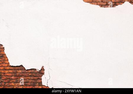 brick wall covered with crumbling plaster, peeling white stucco Stock Photo