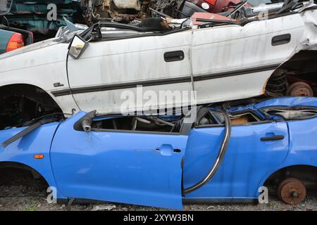 Cars in a scrapyard Stock Photo