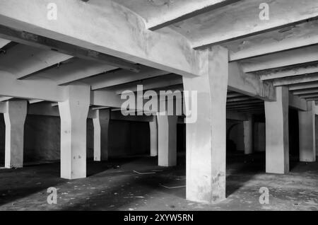 Factory hall with columns in a disused factory in Magdeburg. The building has already been demolished Stock Photo