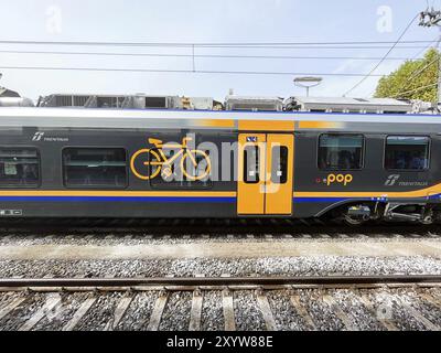 Pisa, Italy. September 18, 2023. Train in Italy equipped with charging points for electric bikes Stock Photo