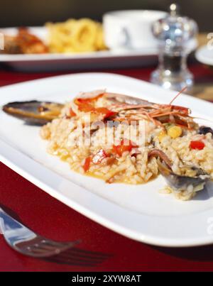 Classic risotto with the seafood in white bowl Stock Photo