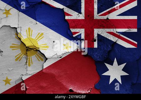 Flags of Philippines and Australia painted on cracked wall Stock Photo