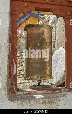 Old Tibetan prayer wheel in Ladakh, India, Asia Stock Photo