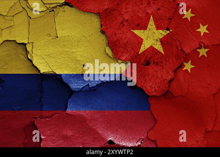 Flags of Colombia and China painted on cracked wall Stock Photo