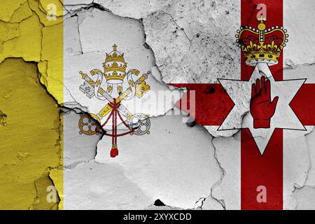 Flag of Vatican and Northern Ireland painted on cracked wall Stock Photo