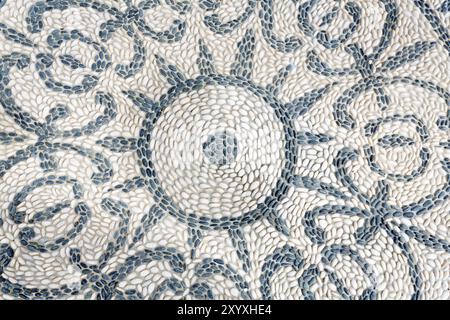 Ornament made of pebbles as a background Stock Photo