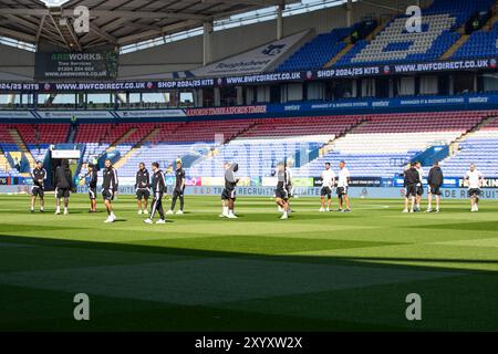 Bolton, Lancashire. UK. 31st Aug 2024. Exeter City during pitch inspection during the Sky Bet League 1 match between Bolton Wanderers and Exeter City at the Toughsheet Stadium, Bolton on Saturday 31st August 2024. (Photo: Mike Morese | MI News) Credit: MI News & Sport /Alamy Live News Stock Photo