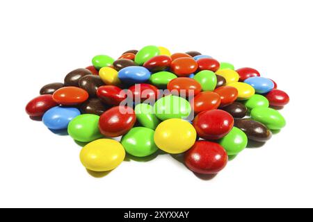 Pile of colorful button shape candies on white background Stock Photo