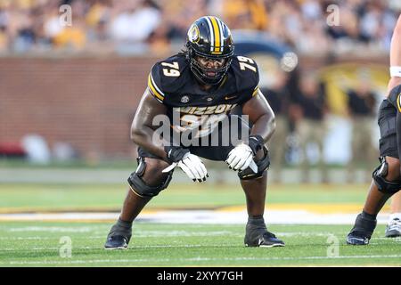 Missouri offensive lineman Armand Membou (79) gets set at the line of ...