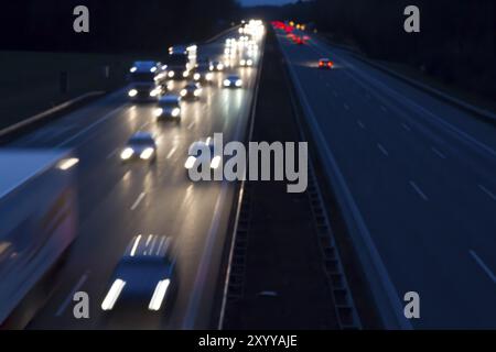 Traffic on the motorway at night Stock Photo