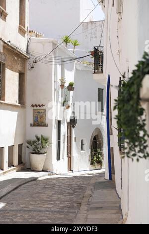 Narrow streets in the old town of Sitges, Spain, Europe Stock Photo