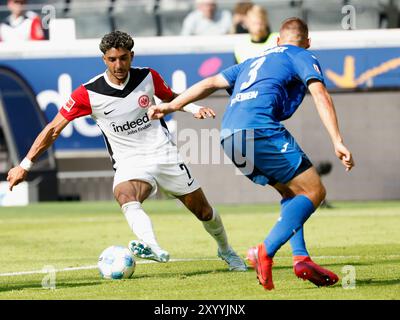 Frankfurt Am Main, Deutschland. 31st Aug, 2024. Omar Marmoush (Eintracht Frankfurt, 7) am Ball versucht Pavel Kaderabek (TSG Hoffenheim, 3) zu umspielen. 31.08.2024, Fussball, 1. Bundesliga, Eintracht Frankfurt - TSG Hoffenheim, GER, Frankfurt am Main, Deutsche Bank Park, DFL REGULATIONS PROHIBIT ANY USE OF PHOTOGRAPHS AS IMAGE SEQUENCES AND/OR QUASI-VIDEO. Credit: dpa/Alamy Live News Stock Photo