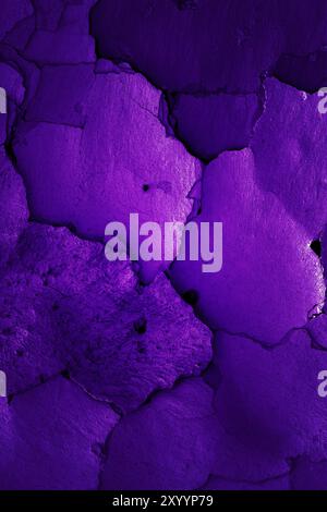Old cracked wall in grape color Stock Photo