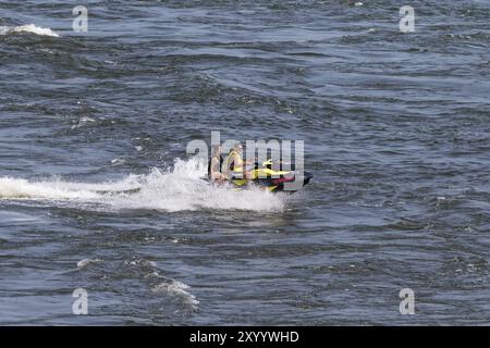 Amphibious water scooter, jetski riding on the Saint Lawrence River, Montreal, Province of Quebec, Canada, North America Stock Photo