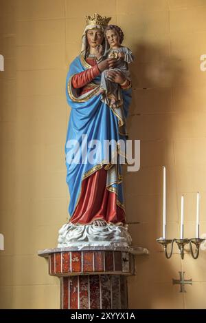 Den Hoorn, Texel, the Netherlands. August 13, 2021. Wooden statues of saints in the church of Den Hoornon the island of Texel Stock Photo