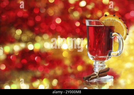 Orange and cranberry punch with spices and Christmas decoration Stock Photo