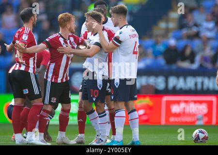 Bolton, Lancashire. UK. 31st Aug 2024. Players during the Sky Bet League 1 match between Bolton Wanderers and Exeter City at the Toughsheet Stadium, Bolton on Saturday 31st August 2024. (Photo: Mike Morese | MI News) Credit: MI News & Sport /Alamy Live News Stock Photo