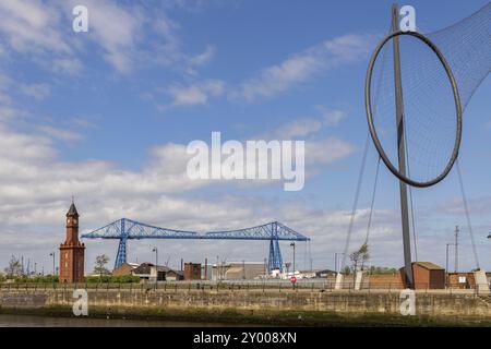 Middlesbrough, England, UK, May 14, 2016: View from the Middlehaven dock towards the transporter bridge, the old clocktower and Temenos Stock Photo