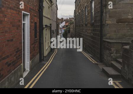 Whitby, North Yorkshire, England, UK, September 13, 2018: Walking through Cliff St Stock Photo