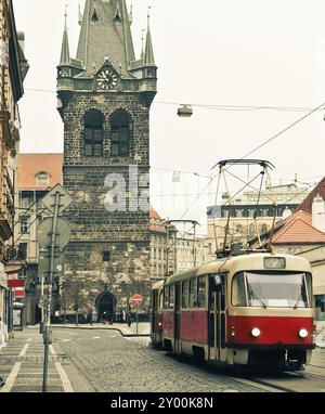 Red tram at old street in Prague. Prague historical Center Stock Photo