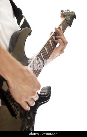 Close up shot of male hand playing electric guitar isolated on white Stock Photo