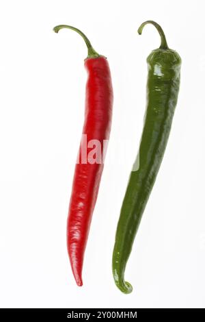 Red and green hot chilli peppers on white background Stock Photo