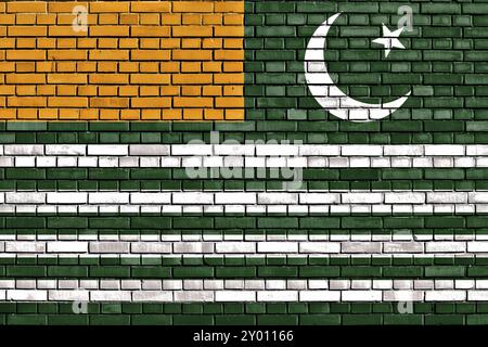 Flag of Azad Kashmir painted on brick wall Stock Photo