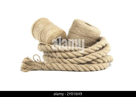 Collection of various rolls of natural jute rough rope and twine isolated on white background Stock Photo