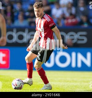 Bolton, Lancashire. UK. 31st Aug 2024. Jack McMillan #2 of Exeter City F.C. during the Sky Bet League 1 match between Bolton Wanderers and Exeter City at the Toughsheet Stadium, Bolton on Saturday 31st August 2024. (Photo: Mike Morese | MI News) Credit: MI News & Sport /Alamy Live News Stock Photo