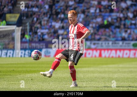 Bolton, Lancashire. UK. 31st Aug 2024. Ryan Woods #6 of Exeter City F.C. during the Sky Bet League 1 match between Bolton Wanderers and Exeter City at the Toughsheet Stadium, Bolton on Saturday 31st August 2024. (Photo: Mike Morese | MI News) Credit: MI News & Sport /Alamy Live News Stock Photo