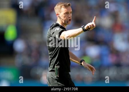 Bolton, Lancashire. UK. 31st Aug 2024. Referee Ben Toner gesticulates during the Sky Bet League 1 match between Bolton Wanderers and Exeter City at the Toughsheet Stadium, Bolton on Saturday 31st August 2024. (Photo: Mike Morese | MI News) Credit: MI News & Sport /Alamy Live News Stock Photo