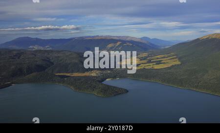 Landscape in New Zealand. Lake Rotoiti. Small village St Arnaud. Hills and mountains in summer Stock Photo